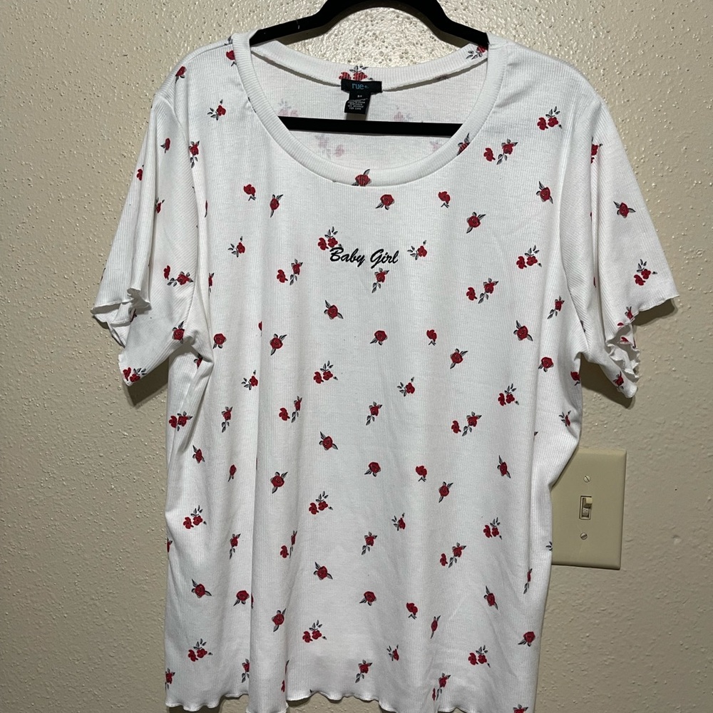 White shirt with small red roses.
